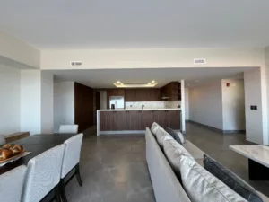 The living, dining, and kitchen areas blend together pleasantly