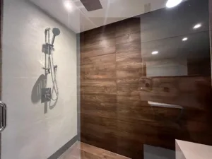 A shower with paneling