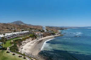 Enjoy wide-angle views of the tranquil El Descanso Bay.