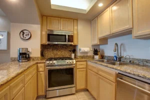 Beautiful granite counter tops, equipped with new, top-of-the-line stainless appliances.