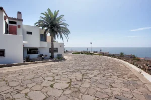 The streets surrounding the house are paved with piedra laja - Plaza del Mar Real Estate