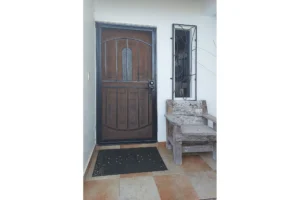 Space at the entry for patio furniture and plants - Plaza del Mar Real Estate