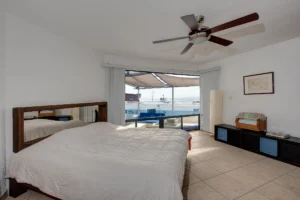 The principal bedroom offers bay-view windows facing the ocean.