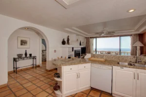 Featuring sleek modern cabinets, generous storage, and a convenient dishwasher.