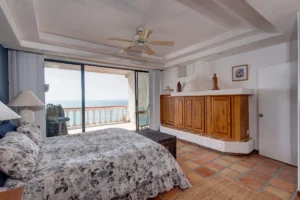 The large patio slider opens to the private oceanfront patio