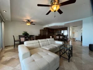 Ocean View Condo for Rent in Rosarito | La Jolla del Mar - Living room features a ceiling fan