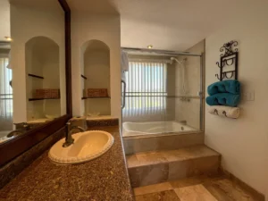 Ocean View Condo for Rent in Rosarito | La Jolla del Mar - master bathroom features a tub