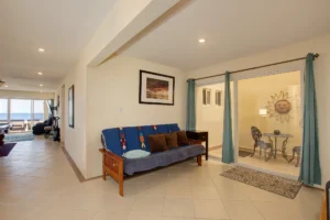 The downstairs unit’s bonus room offers access to a small interior patio.