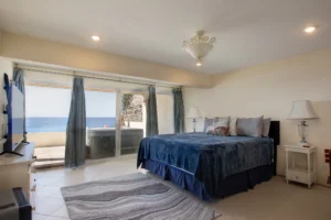 The downstairs bedroom is bright and nicely decorated.