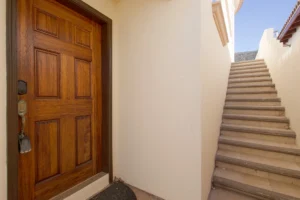 Stairs providing access between the upper and lower levels