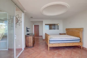 Main bedroom. Existing furniture may be left in place or removed upon request