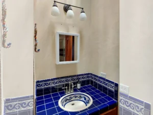 The principal bathroom has a skylight above the vanity
