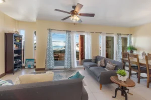 Bright and airy living and dining area with ocean views