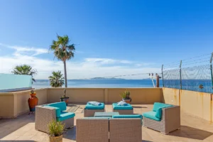 The rooftop deck offers breathtaking 360-degree views of the coastline