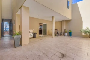 It is partially covered.