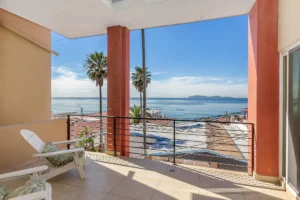 The covered private terrace provides protection from the elements.