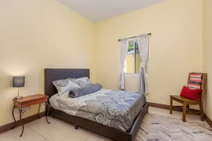 The second bedroom enjoys an eastern mesa view