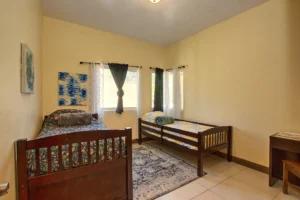 The third bedroom also enjoys eastern mesa views