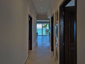 The sea can be seen from the entrance